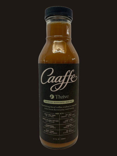 A bottle of CAAFFE Thrive RTD functional decaf coffee beverage